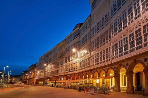 La Coruna facades sunset near Port in Galicia of Spain