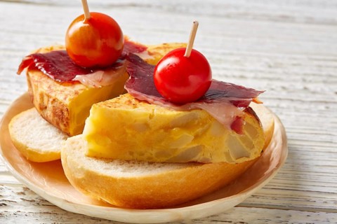 Spanish omelette with iberian ham pincho tapas from Spain food recipes