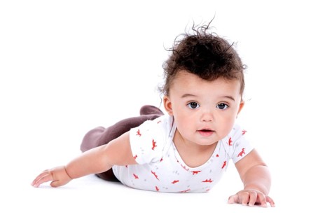 Adorable baby boy wrapped with blanked on white background, Toronto, Canada, North America