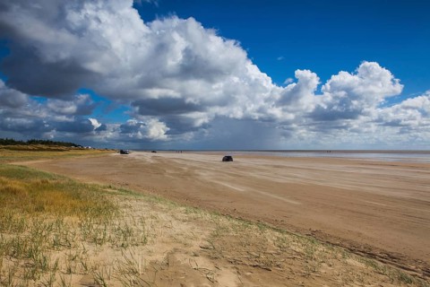 On the amazing Sonderstrand beach on the Romo peninsula, Jutland, Denmark. Scenery after heavy rain