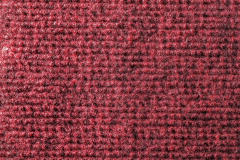 Red kitchen sponge texture vertical view