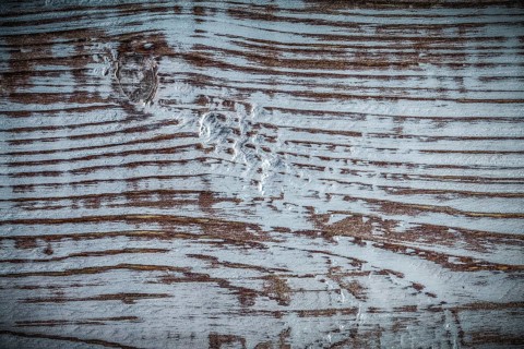 Longstanding natural wooden background top view
