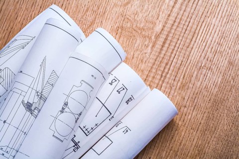 White blueprints on board