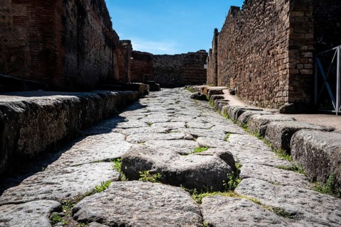 A crosswalk of a typical Roman road in the ancient city of Pompeii, Southern Italy