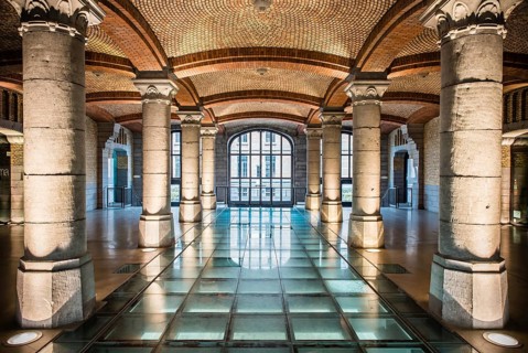 Art nouveau symmetric interior of the Royal Depot of Tour and Taxis, Brussels, Belgium, Europe