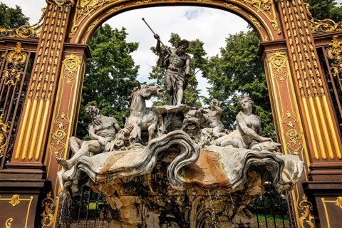Gates and fountains in Stanislas Place, Nancy, France. One of the ornate gates and fountains in