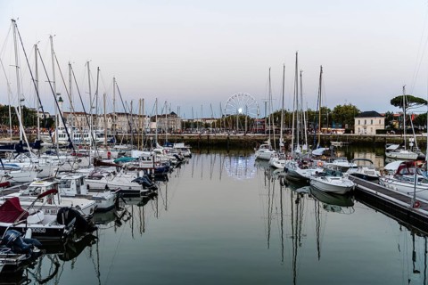 La Rochelle, France, August 6, 2018: The old port. Enclosed by its medieval towers, the picturesque