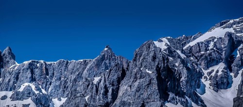 Bermassiv in Austria, Ramsau am Dachstein, rock face with mountain station on the summit #07.06.19