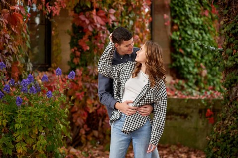 Young Cute Female Hugs Boyfriend. In Autumn Outdoor. Lovers Walking in Park. Attractive Funny