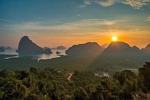 Tropical islands sunrise view at Samed Nang Chee viewpoint with bay to sea ocean, Phang Nga