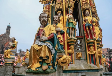 Beautiful fountain on the main market square, tubular fountain with 40 figures from the 14th
