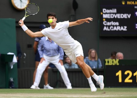 Spanish tennis player Carlos Alcaraz in action at the 2024 Wimbledon Championships, London,