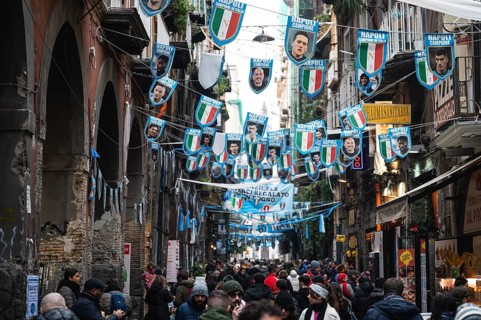 NAPLES, ITALY - JANUARY 14, 2024: A street with the pennants of the football team FC Napoli, the