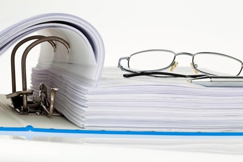 A file folder with documents and papers. Storage of contracts. Austria