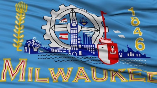 Closeup of Milwaukee City Flag, Waving in the Wind, Wisconsin State, United States of America