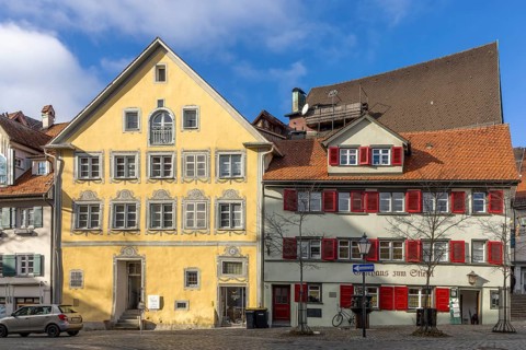 Two buildings and the donkey fountain on Eselbergstraße, Wangen im Allgäu, Baden-Württemberg,