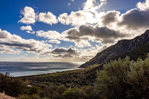 View of the glittering sea and Monte Ferru, Ogliastra, Sardinia, Italy, Europe