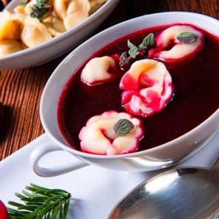 Traditional Polish Christmas Eve borscht with dumplings