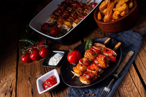 Marinated kebabs with meat and vegetables