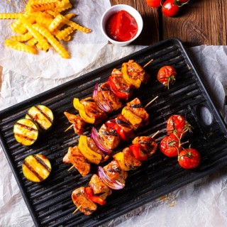 Rustic shish kebab skewers with marinated ham meat paprika and red onion