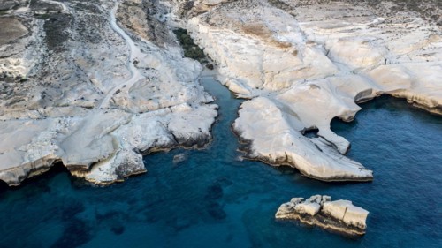White rocks on the coast near Sarakinikoer, aerial view, Milos, Cyclades, Greece, Europe