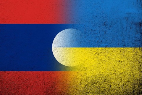 Laos National flag with National flag of Ukraine. Grunge background