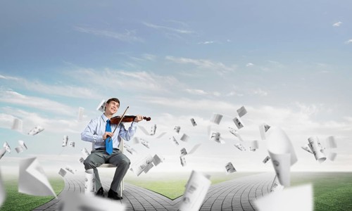 Young businessman is engaged in music, concept of creative chaos in business