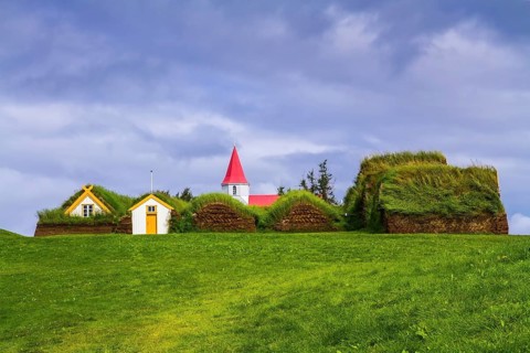 The village ancestors. The reconstituted village early settlers in Iceland. Roofs of houses covered