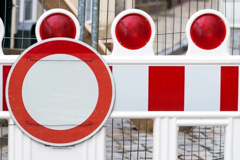 Prohibition sign in front of construction site
