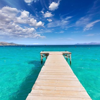 Majorca Platja de Muro beach pier in Alcudia bay in Mallorca Balearic islands of Spain