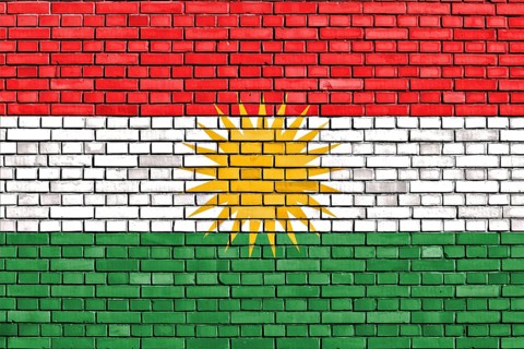 Flag of Kurdistan painted on brick wall