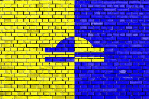 Flag of Ede painted on brick wall