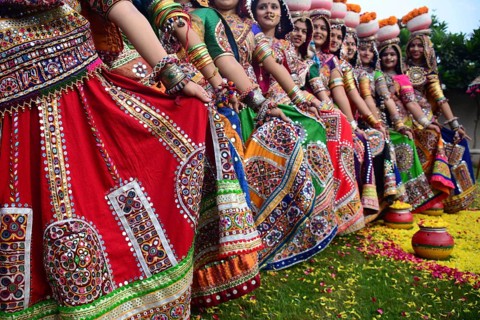 Girls in traditional attire, practice the Garba dance steps in preparation for the Navratri