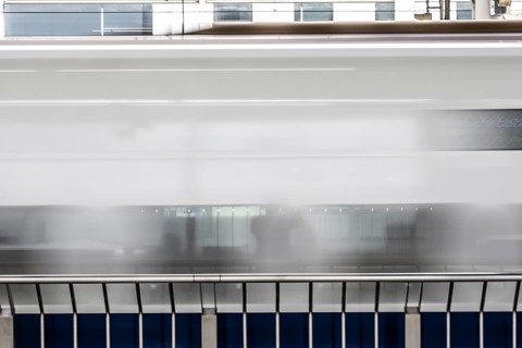 KYOTO, JAPAN - SEPTEMBER 24 2024: A Shinkansen high-speed bullet train arriving at Kyoto Station in