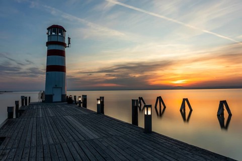 Lighthouse at sunset, long exposure, Podersdorf am See, Lake Neusiedl, Burgenland, Austria, Europe