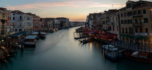 Evening light at sunset, view over the Grand Canal, from the Rialto Bridge, long exposure,