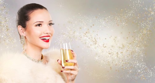Upscale woman wearing gold jewellery and red lipstick on light background, Toronto, Canada, North