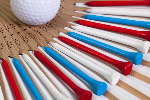 Typical Japanese hand fan made of bamboo and golf equipments