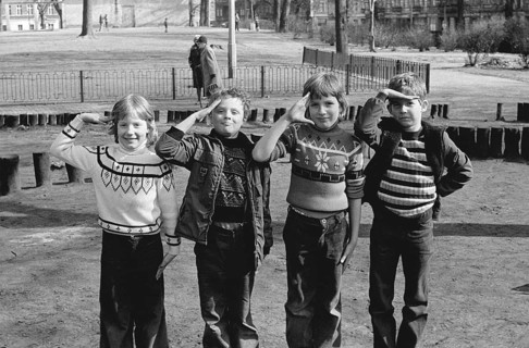 09/09/1978 GDR East Berlin district of Prenzlauer Berg. Three boys and a girl on a playground at