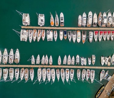 Aerial top view on the luxury yachts and boats in marina