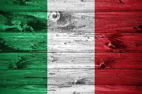 Italy flag on wooden planks background wood flag