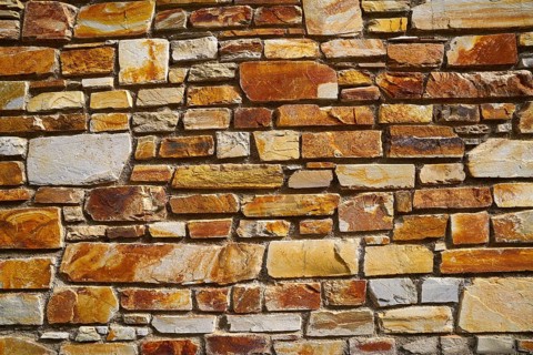 Slate stone masonry stone wall in Andorra Pyrenees