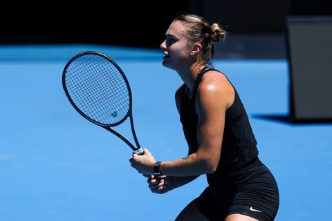 MELBOURNE, AUSTRALIA, JANUARY 12: Aryna Sabalenka of Belarus practices with Paula Badosa of Spain