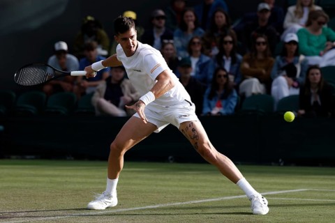 Australian tennis player Thanasi Kokkinakis in action at the 2024 Wimbledon Championships, London,