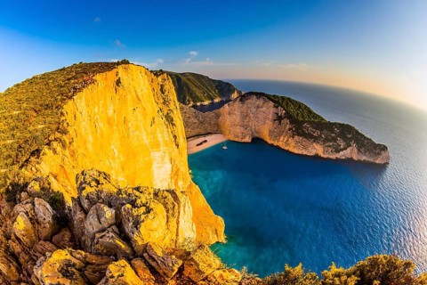 The coast of the Greek island of Zakynthos. Famous Shipwreck Beach. Romantic fabulous sunset. The