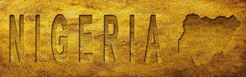 Nigeria Map and Text on Grunge Gold Texture