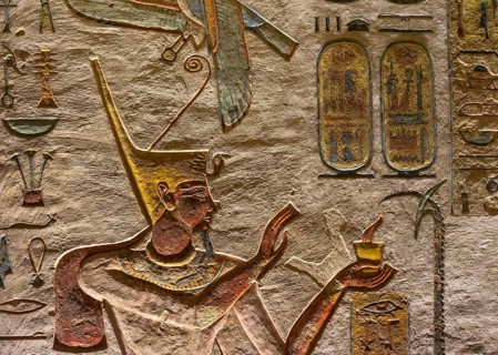 Ancient egypt carving color image on wall of temple in Egypt