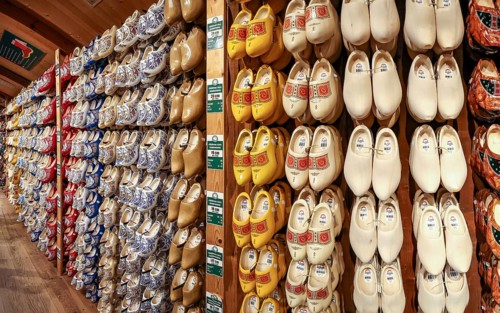 Traditional historical Dutch clog angle (clogs, wooden shoes) on a shelf in museum village, Open