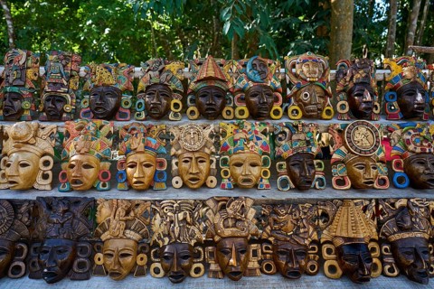 Chichen itza Mayan handcrafted wooden masks in Yucatan Mexico