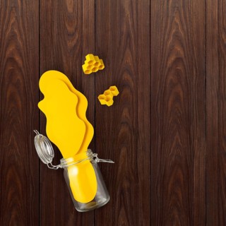 Creative concept still life food health photo of bottle jar of honey made of paper on wooden